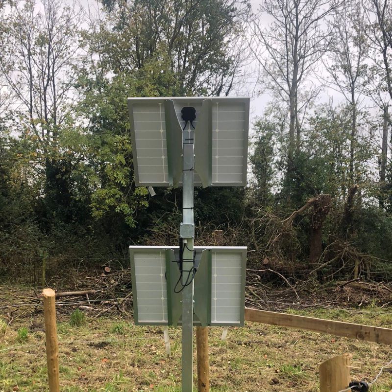 Solar Panels on a Post Powering Electric Gates